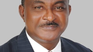 Portrait of George Kweku Ricketts-Hagan, who discussed the next phase of Ghana's 24-hour economy policy; portrait, not a photograph of the interview.